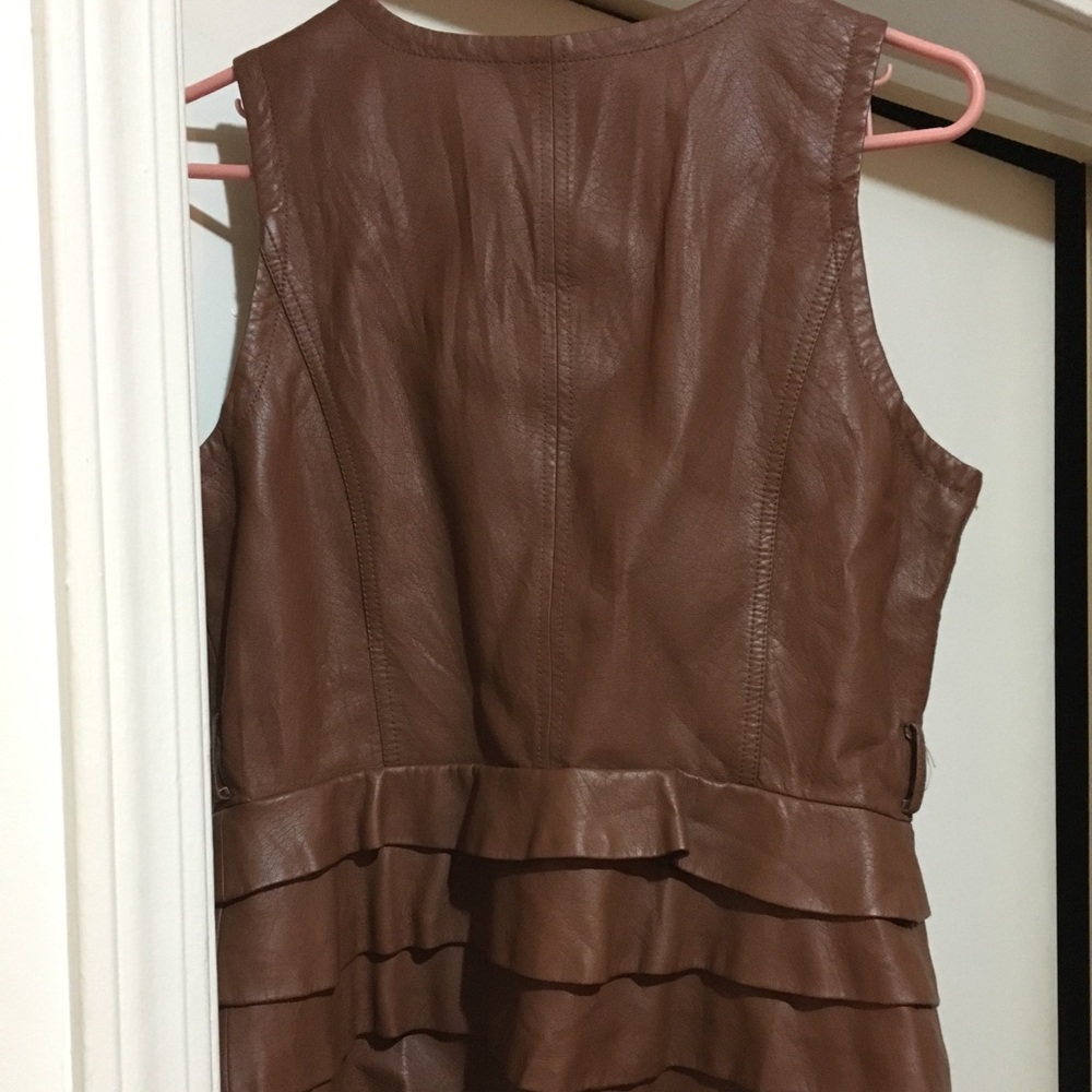 Brown ruffle zip up vest